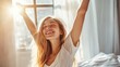 © muhammad - Happy woman stretching arms waking up