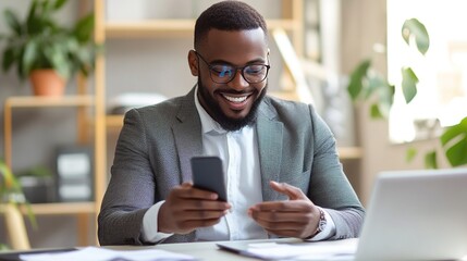 Poster - Happy African American Man Using Smartphone at Desk