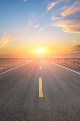 Wall Mural - asphalt highway road and desert with beautiful sky clouds natural landscape at sunset. road trip.