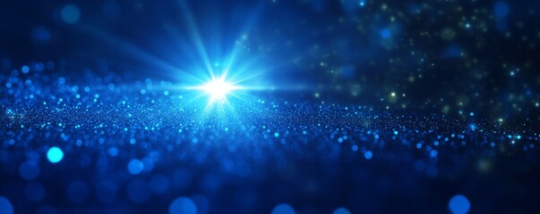 Starburst effect with sparkling blue bokeh lights