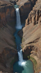 Wall Mural - a waterfall that is flowing down a mountain side