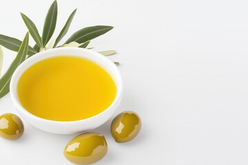 A small bowl of olive oil with several green olives banner with copy space.