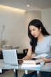 © mojo_cp - Young asian college student using laptop