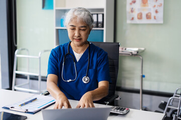 Doctor work on digital tablet healthcare doctor technology tablet using computer in a modern office in the morning at the desk.