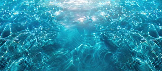 Top view of a swimming pool with a blue reflective surface providing a background with copy space image