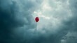 © Bussakon - A Lone Balloon Adrift in the Clouded Sky Representing Disheartened Emotions and Lost Dreams