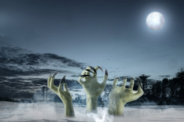 Sticker - Group of witch hand with long black nail coming out of fog with a full moon in the background. The hand appearing to be a evil, satan, zombie or a monster hand