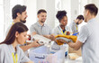 © Studio Romantic - Volunteer team works together to pack food and items into boxes, humanitarian help and community service. Charity and donations reflect a strong commitment to assisting those in need.