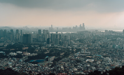 Aerial panorama sunset view of Seoul, Korea from Namsam Mountain on a moody day