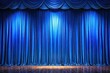 © yuwaree - Low angle panoramic background of blue curtain on stage of theater