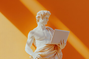 Classical white david statue holding and using a modern technology laptop on orange background with shadows