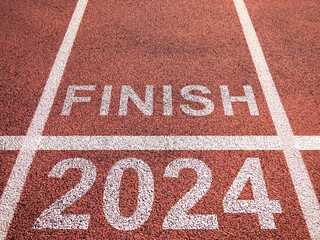 Finish 2024. Inscription on treadmill. End of 2024 season. Finish line for motivation to achieve. New year banner for advertising. Finish line in 2024. Metaphor for christmas approaching.