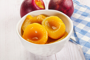 Canvas Print - Canned peaches with sweet syrope