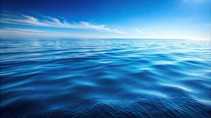 wide-angle water texture sea waves and ripples pattern calm blue nature background