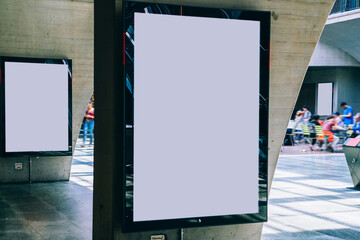 Wall Mural - Clear Billboard in public place with blank copy space screen for advertising or promotional poster content, empty mock up Lightbox for information, blank display in station area with daylight