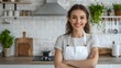 © pkproject - Friendly Woman Wearing Apron Smiling in Home Kitchen