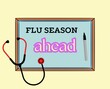 © Urooj - Flu season ahead warning on a board with a stethoscope and a pen