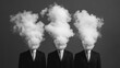© pprothien - Three suited figures with cloud-like heads symbolize confusion or loss of identity in a striking black-and-white visual.