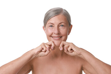 Poster - Beautiful woman doing facial massage on white background