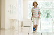 © famveldman - Injured child on crutches. Boy in cast on foot