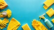 © VisualVault - Bright Yellow Cleaning Supplies and Fabrics Flat Lay on Blue Background for Cleaning Concept