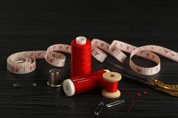 Poster - Many different sewing tools on wooden table