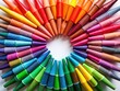 © Man888 - Vibrant Collection of Colorful Crayons Arranged in a Circular Pattern on a White Background