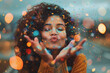© PHAISITSAWAN - A young woman blows confetti from her hands. Friends celebrate outdoors in the evening.