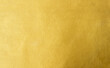 © merrymuuu - Gold wall texture background. Yellow shiny gold foil paper sheet surface, vibrant golden luxury wallpaper