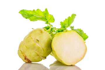 Wall Mural - One whole ripe kohlrabi and one half, macro, isolated on white background.