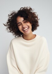 Sticker - A happy hispanic woman wear cream sweater laughing fashion adult.