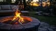 © DZMITRY - In the background, a fire pit is glowing with glowing flames
