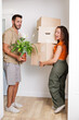 © Lucia PSV - Young couple very happy to have bought their own house. Newly married. A flat just for them. They are owners. Fulfilling a dream. A new stage. Beginnings, Time to pay
