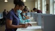 © яна винникова - Individuals filling out ballots at a polling station during an election event with health measures in place
