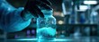 © Starkreal - Scientist in Pharma Lab with Protective Gloves Handling Sample
