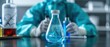 © Starkreal - Scientist in Protective Gear Handling Hazardous Chemicals
