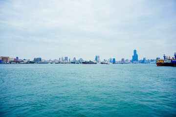 Kaohsiung, Taiwan, Republic of China, 01 25 2024: The landscape of Kaosiung port harbor, downtown,  seen on ferry boat from shiziwan (siziwan, xiziwan), and shoushan mountain to Cijin island