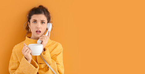 Poster - Beautiful young woman with cup of tea talking by phone against color background