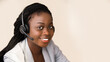 © Prostock-studio - Hotline operator. Portrait of beautiful black female customer service manager wearing headset while working in call center