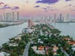 © Zenstratus - The Venetian islands at sunrise in the Biscayne Bay wih a view to downtown Miami, Florida, United States.