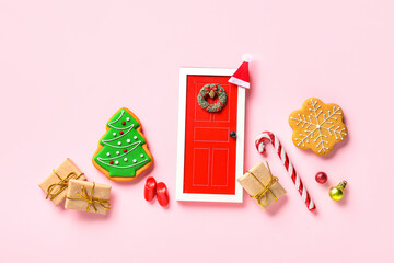 Sticker - Beautiful Christmas composition with gift boxes, gingerbread cookies and different decorations on pink background