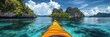 © Joyce - Kayak boat in tropical sea water with rocky mountain island