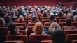 © Morng - A large audience attending a conference or seminar in a theater hall, focusing on the speaker on stage. Blurred background, professional setting.