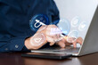 © jittawit.21 - Lead Generation concept. Businessman using laptop with lead generation icon on virtual screen.