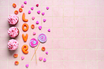 Wall Mural - Word love made of jelly candies with sweets on pink tile background. Valentine's Day celebration