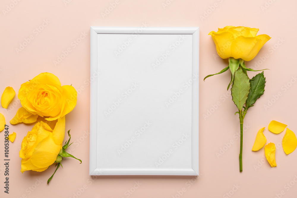 White frame with beautiful yellow roses on beige background