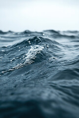 Ocean waves breaking on tropical sea for vertical background