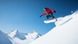 © Photography09 - Snowboarder catching air off a mountain peak, snow flying, showcasing winter adrenaline