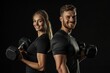 © radekcho - Fitness 30s man and woman with a dumbells in athletic wear, smiling energetically. Portrait on solid black background. Ideal for gym memberships, sportswear, fitness programs.