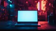 © Arifin Studio - Laptop mockup with blank screen in dark blurred room with neon lights. Vector open laptop front view. Gaming laptop on desk against the background of furniture in room. Realistic vector computer